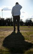 14 March 2025; Umpire Pat Kelly looks on during the 2025 Ladies AIG HEC O'Connor Cup semi-final match between DCU Dóchas Éireann and UU Belfast at Queen's Sport, Queens University, Belfast. Photo by Shauna Clinton/Sportsfile