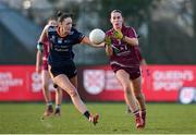 14 March 2025; Katie Connolly of Marino is tackled by Ciara Nyland of ATU Galway during the 2025 Ladies AIG Hec Donaghy Cup final match between ATU Galway and Marino at Queen's Sport, Queens University, Belfast. Photo by Shauna Clinton/Sportsfile