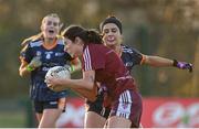 14 March 2025; Chloe Dolan of Marino is tackled by Aalyiah Clohessy of ATU Galway during the 2025 Ladies AIG Hec Donaghy Cup final match between ATU Galway and Marino at Queen's Sport, Queens University, Belfast. Photo by Shauna Clinton/Sportsfile