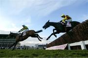 14 March 2025; Galopin Des Champs, with Paul Townend up, jumps the last behind the winner Inothewayurthinkin, with Mark Walsh up, during the Boodles Cheltenham Gold Cup Steeple Chase on day four of the Cheltenham Racing Festival at Prestbury Park in Cheltenham, England. Photo by Harry Murphy/Sportsfile