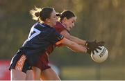 14 March 2025; Jessica Harney of Marino in action against Kamile Butvilaite of ATU Galway during the 2025 Ladies AIG Hec Donaghy Cup final match between ATU Galway and Marino at Queen's Sport, Queens University, Belfast. Photo by Shauna Clinton/Sportsfile
