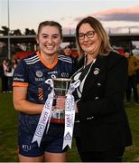 14 March 2025; ATU Galway captain Keeva McDonnell is presented with the trophy by LGFA President Trina Murray after her side's victory in the 2025 Ladies AIG Donaghy Cup final match between ATU Galway and Marino at Queen's Sport in Belfast. Photo by Shauna Clinton/Sportsfile
