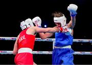 14 March 2025; Lisa O’Rourke of Ireland, left, in action against Natalya Bogdanova of Kazakhstan in their Elite Women 66-70kg light middleweight semi-final bout during the 2025 IBA Women's World Boxing Championships quarter-finals at the Cair Sports Center in Niš, Serbia. Photo by Nikola Krstic/Sportsfile