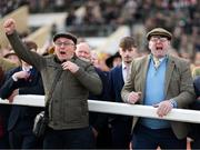 14 March 2025: Owner John O'Leary, left, reacts watching his horse Wonderwall on their way to winning the St James's Place Festival Challenge Cup Open Hunters' Chase on day four of the Cheltenham Racing Festival at Prestbury Park in Cheltenham, England. Photo by Harry Murphy/Sportsfile