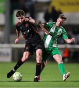 14 March 2025; Eoin Kenny of Dundalk in action against Cian Doyle of Bray Wanderers during the SSE Airtricity Men's First Division match between Bray Wanderers and Dundalk at Carlisle Grounds in Bray, Wicklow. Photo by Thomas Flinkow/Sportsfile
