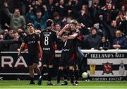 14 March 2025; Eoin Kenny of Dundalk, right, celebrates with teammates, including Daryl Horgan, 7, after scoring his side's third goal during the SSE Airtricity Men's First Division match between Bray Wanderers and Dundalk at Carlisle Grounds in Bray, Wicklow. Photo by Thomas Flinkow/Sportsfile