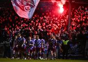 14 March 2025; Drogheda United players and supporters celebrate their first goal, scored by Conor Keeley, hidden, during the SSE Airtricity Men's Premier Division match between Drogheda United and Shamrock Rovers at Sullivan & Lambe Park in Drogheda, Louth. Photo by Ben McShane/Sportsfile