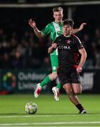 14 March 2025; Andy Paraschiv of Dundalk in action against Cian Doyle of Bray Wanderers during the SSE Airtricity Men's First Division match between Bray Wanderers and Dundalk at Carlisle Grounds in Bray, Wicklow. Photo by Thomas Flinkow/Sportsfile