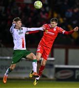 14 March 2025; Sean Gannon of Shelbourne in action against Alex Nolan of Cork City during the SSE Airtricity Men's Premier Division match between Shelbourne and Cork City at Tolka Park in Dublin. Photo by Sam Barnes/Sportsfile