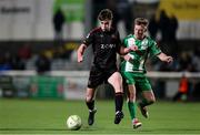 14 March 2025; Eoin Kenny of Dundalk in action against Cian Doyle of Bray Wanderers during the SSE Airtricity Men's First Division match between Bray Wanderers and Dundalk at Carlisle Grounds in Bray, Wicklow. Photo by Thomas Flinkow/Sportsfile
