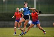 15 March 2025; Brid Cotter of UCD in action against Lydia McDonagh of MIC Limerick during the 2025 Ladies AIG Giles Cup final match between MIC Limerick and UCD at Queen's Sport, Queens University, Belfast. Photo by Ben McShane/Sportsfile