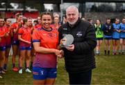 15 March 2025; Lydia McDonagh of MIC Limerick is presented with the Player of the Match award by Ladies HEC Chairperson, Daniel Caldwell, after the 2025 Ladies AIG Giles Cup final match between MIC Limerick and UCD at Queen's Sport, Queens University, Belfast. Photo by Ben McShane/Sportsfile
