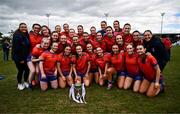 15 March 2025; MIC Limerick players celebrate with the Giles Cup after the 2025 Ladies AIG Giles Cup final match between MIC Limerick and UCD at Queen's Sport, Queens University, Belfast. Photo by Ben McShane/Sportsfile