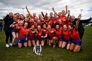15 March 2025; MIC Limerick players celebrate with the Giles Cup after the 2025 Ladies AIG Giles Cup final match between MIC Limerick and UCD at Queen's Sport, Queens University, Belfast. Photo by Ben McShane/Sportsfile