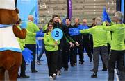 15 March 2025; Gavin Bourke of Team Ireland, a member of Mallow Special Olympics Club, Doneraile, Cork, leads out the Floorball Bronze Medal winning Team Ireland during the medal presentations on day seven of the Turin 2025 Special Olympics World Winter Games in the Inalpi Arena, Turin, Italy. Photo by Ray McManus/Sportsfile