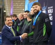 15 March 2025; Gavin Bourke of Team Ireland, a member of Mallow Special Olympics Club, Doneraile, Cork, a member of the Floorball Bronze Medal winning Team Ireland, is presented with his medal by Special Olympics Ireland CEO Matt English during the medal presentations on day seven of the Turin 2025 Special Olympics World Winter Games in the Inalpi Arena, Turin, Italy. Photo by Ray McManus/Sportsfile