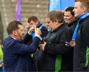 15 March 2025; James Upton of Team Ireland, a member of Waterford Special Olympics Club, Passage East, Waterford, a member of the Floorball Bronze Medal winning Team Ireland, is presented with his medal by Special Olympics Ireland CEO Matt English during the medal presentations on day seven of the Turin 2025 Special Olympics World Winter Games in the Inalpi Arena, Turin, Italy. Photo by Ray McManus/Sportsfile