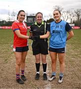 15 March 2025; Referee Sinead McHugh with team captains Rachael Evans of MTU Cork, left, and Saoirse Murphy of UCD 2 before the 2025 Ladies AIG Lynch final match between MTU Cork and UCD at Queen's Sport, Queens University, Belfast. Photo by Ben McShane/Sportsfile