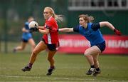 15 March 2025; Maeve Daly of MTU Cork in action against Roisin McKenna of UCD 2 during the 2025 Ladies AIG Lynch final match between MTU Cork and UCD at Queen's Sport, Queens University, Belfast. Photo by Ben McShane/Sportsfile
