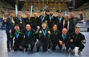15 March 2025; Team Ireland players and coachs celebrate after they were presented with the Floorball Bronze Medal at the medal presentations on day seven of the Turin 2025 Special Olympics World Winter Games in the Inalpi Arena, Turin, Italy. Photo by Ray McManus/Sportsfile