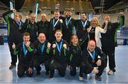 15 March 2025; Team Ireland players and coachs celebrate after they were presented with the Floorball Bronze Medal at the medal presentations on day seven of the Turin 2025 Special Olympics World Winter Games in the Inalpi Arena, Turin, Italy. Photo by Ray McManus/Sportsfile