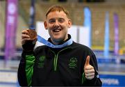 15 March 2025; James Hunter of Team Ireland, a member of Mallow Special Olympics Club, Mallow, Cork, a member of Mallow Special Olympics Club, Doneraile, Cork, who played on the winning Floorball Bronze Medal team is pictured with his medal after the medal presentations on day seven of the Turin 2025 Special Olympics World Winter Games in the Inalpi Arena, Turin, Italy. Photo by Ray McManus/Sportsfile
