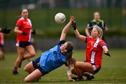15 March 2025; Caolfhionn Ni Nuallain of UCD 2 in action against Siobhan Callanan of MTU Cork during the 2025 Ladies AIG Lynch final match between MTU Cork and UCD at Queen's Sport, Queens University, Belfast. Photo by Ben McShane/Sportsfile
