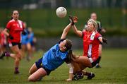 15 March 2025; Caolfhionn Ni Nuallain of UCD 2 in action against Siobhan Callanan of MTU Cork during the 2025 Ladies AIG Lynch final match between MTU Cork and UCD at Queen's Sport, Queens University, Belfast. Photo by Ben McShane/Sportsfile