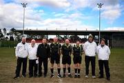 15 March 2025; Referee Eddie Cuthbert with his team of officials before the 2025 Ladies AIG O’Connor Cup final match between DCU Dóchas Éireann and UCC at Queen's Sport, Queens University, Belfast. Photo by Ben McShane/Sportsfile
