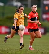 15 March 2025; Leah Fox of DCU Dóchas Éireann in action against Rosie Corkery of UCC during the 2025 Ladies AIG O’Connor Cup final match between DCU Dóchas Éireann and UCC at Queen's Sport, Queens University, Belfast. Photo by Ben McShane/Sportsfile