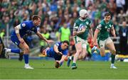 15 March 2025; Mack Hansen of Ireland evades the tackle of Paolo Garbisi of Italy during the Guinness Six Nations Rugby Championship match between Italy and Ireland at the Stadio Olimpico in Rome, Italy. Photo by Ramsey Cardy/Sportsfile