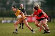 15 March 2025; Leah Fox of DCU Dóchas Éireann in action against Dara Kiniry of UCC during the 2025 Ladies AIG O’Connor Cup final match between DCU Dóchas Éireann and UCC at Queen's Sport, Queens University, Belfast. Photo by Ben McShane/Sportsfile