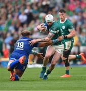 15 March 2025; Mack Hansen of Ireland in action against Niccolò Cannone of Italy during the Guinness Six Nations Rugby Championship match between Italy and Ireland at the Stadio Olimpico in Rome, Italy. Photo by Ramsey Cardy/Sportsfile
