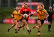 15 March 2025; Aimee Corcoran of UCC in action against Fionnuala McLaughlin of DCU Dóchas Éireann during the 2025 Ladies AIG O’Connor Cup final match between DCU Dóchas Éireann and UCC at Queen's Sport, Queens University, Belfast. Photo by Ben McShane/Sportsfile