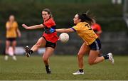 15 March 2025; Roisin Ennis of UCC in action against Laoise Lenehan of DCU Dóchas Éireann during the 2025 Ladies AIG O’Connor Cup final match between DCU Dóchas Éireann and UCC at Queen's Sport, Queens University, Belfast. Photo by Ben McShane/Sportsfile