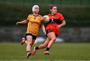 15 March 2025; Aimee Corcoran of UCC in action against Aishling Hanly of DCU Dóchas Éireann during the 2025 Ladies AIG O’Connor Cup final match between DCU Dóchas Éireann and UCC at Queen's Sport, Queens University, Belfast. Photo by Ben McShane/Sportsfile