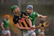 15 March 2025; Martin Keoghan of Kilkenny scores a point  as Mike Casey of Limerick breaks his hurley trying to stop the shot during the Allianz Hurling League Division 1A match between Kilkenny and Limerick at UPMC Nowlan Park in Kilkenny. Photo by Sam Barnes/Sportsfile