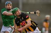 15 March 2025; Martin Keoghan of Kilkenny scores a point  as Mike Casey of Limerick breaks his hurley trying to stop the shot during the Allianz Hurling League Division 1A match between Kilkenny and Limerick at UPMC Nowlan Park in Kilkenny. Photo by Sam Barnes/Sportsfile