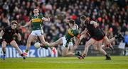 15 March 2025; Diarmuid O'Connor of Kerry is tackled by Connaire Mackin of Armagh during the Allianz Football League Division 1 match between Kerry and Armagh at Austin Stack Park in Tralee, Kerry. Photo by Brendan Moran/Sportsfile