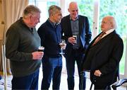 15 March 2025; President of Ireland Michael D Higgins with, from left, Kevin Sheedy, Chris Hughton and David Kelly of the Republic of Ireland squad from the Italia 1990 FIFA World Cup at Áras an Uachtaráin in Dublin. Photo by Stephen McCarthy/Sportsfile