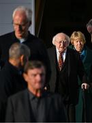 15 March 2025; President of Ireland Michael D Higgins and his wife Sabina with members of the Republic of Ireland squad from the Italia 1990 FIFA World Cup at Áras an Uachtaráin in Dublin. Photo by Stephen McCarthy/Sportsfile