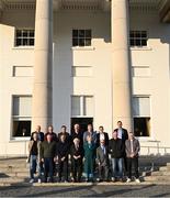 15 March 2025; President of Ireland Michael D Higgins and his wife Sabina with members of the Republic of Ireland squad from the Italia 1990 FIFA World Cup, back row, from left, David Kelly, Ronnie Whelan, Kevin Moran, team captain Mick McCarthy, Steve Staunton, Bernie Slaven and Niall Quinn, with, front row, Chris Morris, Kevin Sheedy, Chris Hughton, kitman Charlie O’Leary, Frank Stapleton and John Aldridge at Áras an Uachtaráin in Dublin. Photo by Stephen McCarthy/Sportsfile