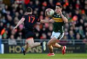 15 March 2025; Joe O'Connor of Kerry is tackled by Peter McGrane of Armagh during the Allianz Football League Division 1 match between Kerry and Armagh at Austin Stack Park in Tralee, Kerry. Photo by Brendan Moran/Sportsfile