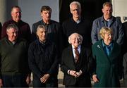 15 March 2025; President of Ireland Michael D Higgins and his wife Sabina with members of the Republic of Ireland squad from the Italia 1990 FIFA World Cup, back row, from left, Ronnie Whelan, Kevin Moran, team captain Mick McCarthy and Steve Staunton, with, front row, Kevin Sheedy and Chris Hughton at Áras an Uachtaráin in Dublin. Photo by Stephen McCarthy/Sportsfile