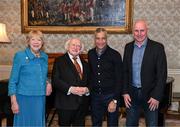 15 March 2025; President of Ireland Michael D Higgins and wife Sabina with Chris Hughton and David Kelly, right, of the Republic of Ireland squad from the Italia 1990 FIFA World Cup at Áras an Uachtaráin in Dublin. Photo by Stephen McCarthy/Sportsfile