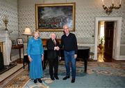 15 March 2025; President of Ireland Michael D Higgins and wife Sabina with team captain Mick McCarthy of the Republic of Ireland squad from the Italia 1990 FIFA World Cup at Áras an Uachtaráin in Dublin. Photo by Stephen McCarthy/Sportsfile