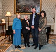 15 March 2025; President of Ireland Michael D Higgins and wife Sabina with Niall Quinn and wife Gillian of the Republic of Ireland squad from the Italia 1990 FIFA World Cup at Áras an Uachtaráin in Dublin. Photo by Stephen McCarthy/Sportsfile