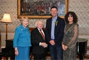 15 March 2025; President of Ireland Michael D Higgins and wife Sabina with Niall Quinn and wife Gillian of the Republic of Ireland squad from the Italia 1990 FIFA World Cup at Áras an Uachtaráin in Dublin. Photo by Stephen McCarthy/Sportsfile