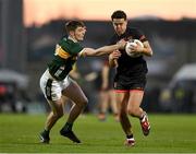 15 March 2025; Stefan Campbell of Armagh is tackled by Diarmuid O'Connor of Kerry during the Allianz Football League Division 1 match between Kerry and Armagh at Austin Stack Park in Tralee, Kerry. Photo by Brendan Moran/Sportsfile