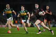 15 March 2025; Jarly Og Burns of Armagh in action against Joe O'Connor and Mike Breen of Kerry during the Allianz Football League Division 1 match between Kerry and Armagh at Austin Stack Park in Tralee, Kerry. Photo by Brendan Moran/Sportsfile